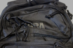15″ X 11″ X 4″ BACKPACK ALL BLACK WITH “NRA” INSCRIPTION SEWN EMBROIDERED
