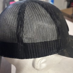 SPORT-TEK 2026 NRA Show Silencer Shop Dark Camo Trucker Hat OSFA